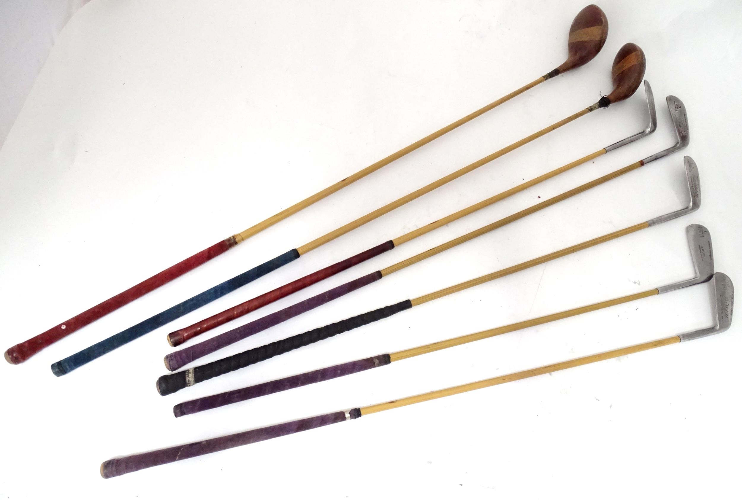 A quantity of mid 20thC golf clubs Please Note - we do not make reference to the condition of lots