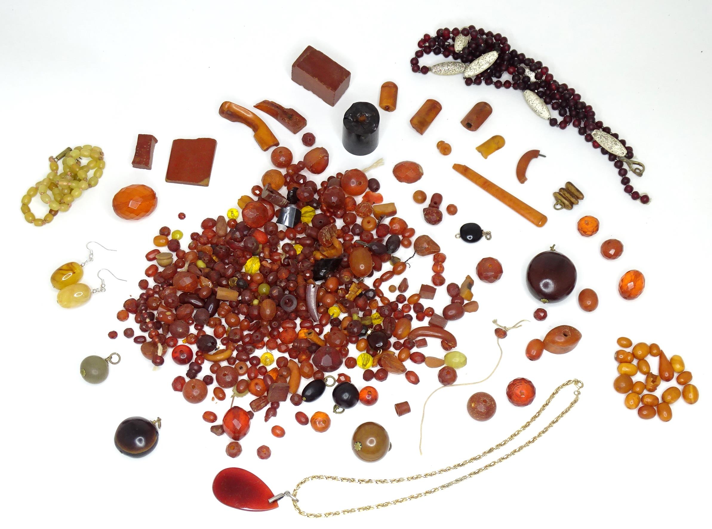 A quantity of assorted vintage beads to include cherry & butterscotch coloured amber style