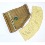Musical Instrument: a mid 20thC cased zither / autoharp, bearing interior label: 'Supertone Stringed