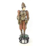 Militaria: a 20thC Papal Guard style display suit of armour, constructed from silver plated panels