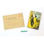 Three Oscar Wilde / theatre related items to include a green glass posy holder with the etched