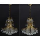 A pair of contemporary gilt metal chandelier electroliers by Pecaso Lighting of Brooklin, New