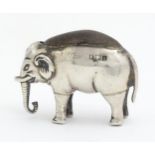 An early 20thC novelty silver pin cushion modelled as an elephant, hallmarked Birmingham 1906, maker