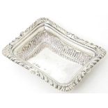 A Victorian silver dish of squared form hallmarked Chester 1896. Approx. 3 1/2" wide Please Note -