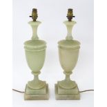 A pair of green onyx table lamps of urn form on a stepped base. Approx. 19 1/2" high (2) Please Note