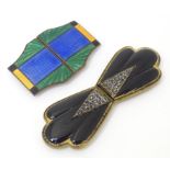 Two Art Deco buckles, one with marcasite decoration, the other wit guilloche enamel style