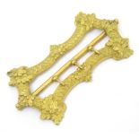 A Victorian gilt metal buckle with acanthus leaf decoration 3" long Please Note - we do not make