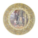 A Prattware plate decorated with a street scene with misbehaving children, with an oak leaf and