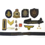Militaria: a quantity of military insignia, including a Kriegsmarine cap ribbon, Kriegsmarine