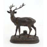 A French 19thC bronze model of a stag signed Alfred Dubucand to base, with inscription to stand Golf