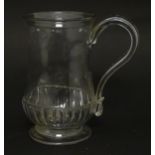 A Georgian glass tankard with loop handle approx. 5 /2" high Please Note - we do not make