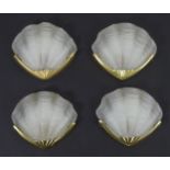 A set of four Art Deco style wall lights with frosted scallop shell formed shades. Approx. 9 1/2"