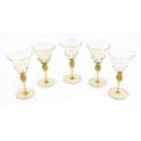 A set of five Salviati Venetian Renaissance Revival glass wine glasses, the octagonal bowls with