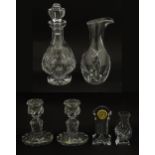 A quantity of assorted crystal / glassware to include a pair of candlesticks by Baccarat, together