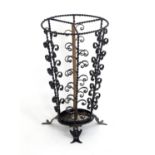 An early 20thC cast stick / umbrella stand with twist and scroll detail. Approx. 20" high Please