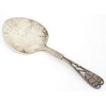 A Danish silver pastry server with hammered decoration, maker Georg Jensen. Denmark, Sterling and