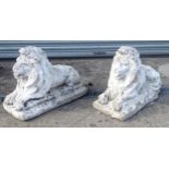 Garden Statuary : A pair of 20thC composite stone recumbent lions. Approx. 27" long (2) Please