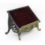A mid / late 19thC bible / reading stand with an ebonised pierced frame and Gothic decoration,