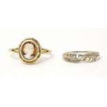 A 9ct gold ring set with cameo to top. Ring size approx. M 1/2 together with a white gold ring (