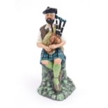 A Royal Doulton figure The Piper, model no. HN2907, modelled by Miachel Abberley. Approx. 8" high