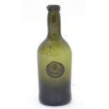 A late 18thC / early 19thC sealed bottle, the light olive glass bottle with dragon seal. ( small