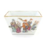 A Chinese bowl of squared form decorated with Imperial / elder figures and attendants in a