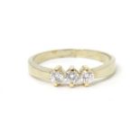 A 14 ct gold ring set with trio of diamonds. Ring size approx P Please Note - we do not make