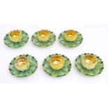 A set of six German yellow rose tea cups and saucers by Car Knoll, Carlsbad, the cups with floral