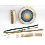 Mid 20thC Archery items, comprising two wooden bows with cloth cases, one marked F H Ayres, London