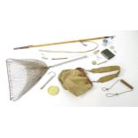 A quantity of mid to late 20thC fishing equipment, comprising a 53" boat gaff, a landing net and a