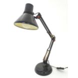 An adjustable desk lamp in the Anglepoise style, marked under Patent Pending, and bearing