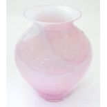 A Scottish Caithness glass vase with pink and white decoration. Approx. 10" high Please Note - we do