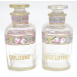 A 19thC glass dressing table canisters: a pair hand painted clear glass canisters with stoppers each