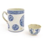 A Chinese blue and white mug with floral roundel decoration and a banded border. Together with a