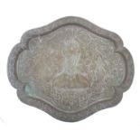 A 20thC Indian brass tray with lobed rim, engraved with deity Ganesha with attendants and