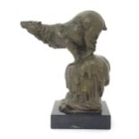 A Continental 20thC bronze sculpture depicting a polar bear on an iceberg, signed Milo to reverse.