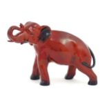 A Royal Doulton flambe model of an elephant. Marked under. Approx. 5 1/4" high Please Note - we do