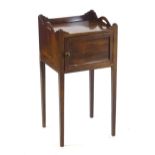 A late 18thC mahogany bedside cabinet / pot cupboard, with a tray style top with a raised upstand