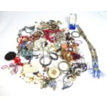 A quantity of assorted costume jewellery to include necklaces, beads, bracelets, etc. Together