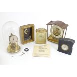 Five assorted mantel clocks to include a 400 day anniversary clock, carriage clock, an example by