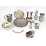 A quantity of assorted silver plated wares to include salvers, caster, mustard pot etc Please Note -