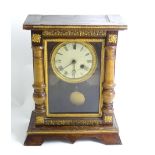 A mantel clock with white enamel dial having Roman numerals and winding hole at four. Please