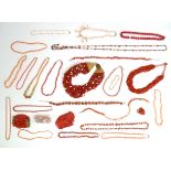 A quantity of assorted bead necklaces to include some coral bead examples Please Note - we do not