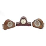 Three various mantel clocks to include a Napoleon hat example, examples by Smiths, etc. (3) Please