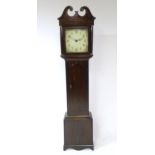 A longcase clock with pained 12" dial. The whole approx. 82" high Please Note - we do not make