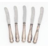 Five silver handled tea knives, the blades stamped Harrods ltd. Brompton Road S.W. Approx. 6 1/2"