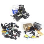 A quantity of mid to late 20thC 35mm film cameras, including examples by Nikon, Canon, Pentax,