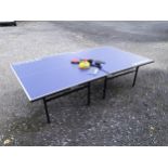 A Donnay table tennis table, together with assorted bats, balls, etc. Please Note - we do not make