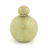 A Royal Worcester scent bottle of globular form decorated with a turquoise ground and gilt foliate