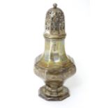 A silver sugar caster of octagonal baluster form, hallmarked Sheffield 1917, maker Levesley